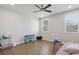 Bright bedroom with neutral walls, hardwood floors, and ample space, perfect for a restful retreat at 83 Arnold Poplar Ln, Auburn, GA 30011