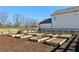 A flourishing community garden with raised garden beds, offering residents a space for gardening and fresh produce at 83 Arnold Poplar Ln, Auburn, GA 30011