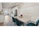 Charming dining area featuring a marble table and a cozy bench at 83 Arnold Poplar Ln, Auburn, GA 30011
