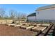 Inviting community garden featuring several raised beds, perfect for growing vegetables and flowers at 83 Arnold Poplar Ln, Auburn, GA 30011