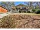 Charming single-Gathering home features a covered front porch and carport, with a well-maintained lawn at 1031 Willivee Dr, Decatur, GA 30033