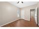 Bedroom featuring hardwood floors and bright window at 1477 Akridge Nw St, Atlanta, GA 30314