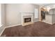 Living room featuring wood-look floors and a fireplace at 1477 Akridge Nw St, Atlanta, GA 30314