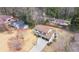 A charming home with a spacious yard and a convenient driveway, highlighted in an aerial view at 2167 Cedar Dr, Lawrenceville, GA 30043