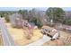 Expansive property showcases a well-maintained lawn and appealing surroundings from an aerial perspective at 2167 Cedar Dr, Lawrenceville, GA 30043