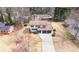 Charming two-story home boasts a manicured front yard and an inviting entrance from an aerial view at 2167 Cedar Dr, Lawrenceville, GA 30043