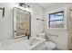 Modern bathroom boasting a stone shower and quartz countertop at 2167 Cedar Dr, Lawrenceville, GA 30043