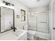 Bright bathroom boasting a shower/tub combo at 2167 Cedar Dr, Lawrenceville, GA 30043