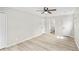 Bright bedroom featuring hardwood floors and neutral paint at 2167 Cedar Dr, Lawrenceville, GA 30043