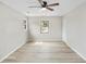 Spacious bedroom featuring hardwood floors and a view at 2167 Cedar Dr, Lawrenceville, GA 30043