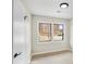 Cozy bedroom with hardwood floors and a view of the neighborhood at 2167 Cedar Dr, Lawrenceville, GA 30043