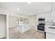 Bright kitchen featuring a center island, stainless steel appliances, and modern pendant lighting at 2167 Cedar Dr, Lawrenceville, GA 30043