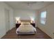 Inviting bedroom with a window and wood laminate floors at 2173 Wellington Cir, Lithonia, GA 30058