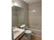 Standard bathroom with a combination tub and shower at 406 Hawkstone Way, Alpharetta, GA 30022