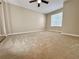 Spacious bedroom with neutral carpet, large window, and ample natural light at 406 Hawkstone Way, Alpharetta, GA 30022