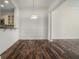 Dining room with hardwood floors and open to the kitchen at 850 Piedmont Ne Ave # 1302, Atlanta, GA 30308