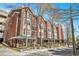 Brick building with a traditional design and inviting covered entrances and manicured landscaping at 850 Piedmont Ne Ave # 1302, Atlanta, GA 30308
