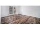 Bright room with hardwood floors and French doors leading to a balcony at 850 Piedmont Ne Ave # 1302, Atlanta, GA 30308