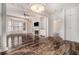 Bright living room featuring hardwood floors, fireplace, large windows, and open layout at 850 Piedmont Ne Ave # 1302, Atlanta, GA 30308