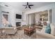 Living room with fireplace and kitchen and dining area in an open layout at 850 Piedmont Ne Ave # 1302, Atlanta, GA 30308