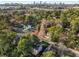 An elevated view of a leafy neighborhood and home, with a distant city skyline backdrop at 993 Northrope Ne Dr, Atlanta, GA 30324