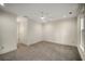 Spacious, carpeted bedroom with ceiling fan, crown molding, and neutral walls at 993 Northrope Ne Dr, Atlanta, GA 30324