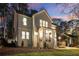 Beautiful two-story home with a well-lit front exterior and manicured landscaping at 993 Northrope Ne Dr, Atlanta, GA 30324