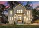 Beautiful two-story home with a well-manicured lawn, attractive curb appeal and a warm, inviting ambiance at 993 Northrope Ne Dr, Atlanta, GA 30324