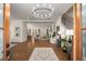 Bright and airy living room featuring hardwood floors, modern decor, and an open layout with views to the kitchen at 993 Northrope Ne Dr, Atlanta, GA 30324