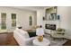 Inviting living room with a fireplace, stylish seating, and a bright atmosphere with views to the back yard at 993 Northrope Ne Dr, Atlanta, GA 30324