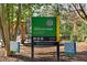 Image of the Armand Park signage, providing information on location, hours, and amenities at 993 Northrope Ne Dr, Atlanta, GA 30324