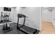 Home gym featuring a treadmill and elliptical machines with rubber flooring at 2023 Stoneleigh Dr, Stone Mountain, GA 30087