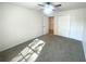 Well-lit bedroom with carpet floors, ceiling fan, and a closet for ample storage at 3078 Parc Lorraine, Lithonia, GA 30038