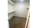 Walk-in closet with shelves, offering ample storage space and organization options at 3078 Parc Lorraine, Lithonia, GA 30038