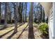 Spacious backyard with mature trees, offering privacy and ample space for outdoor activities at 3331 Casa Linda Dr, Decatur, GA 30032