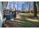 Lush backyard with a deck, outbuilding for storage, and manicured lawn at 3331 Casa Linda Dr, Decatur, GA 30032