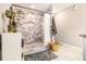 Modern bathroom with a beautifully tiled shower and marble flooring at 3331 Casa Linda Dr, Decatur, GA 30032