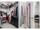 Walk-in closet with ample storage space and views to the bedroom at 4809 Shae Ct, Powder Springs, GA 30127