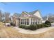 Charming brick home featuring large windows, manicured landscaping, and inviting curb appeal at 4809 Shae Ct, Powder Springs, GA 30127