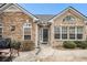 Charming stone and brick facade with a well-maintained yard and an inviting front entry at 4809 Shae Ct, Powder Springs, GA 30127