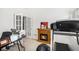 Relaxing home gym with cozy fireplace and workout equipment at 4809 Shae Ct, Powder Springs, GA 30127