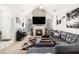 Cozy living room with vaulted ceilings, fireplace, ample seating, and stylish decor at 4809 Shae Ct, Powder Springs, GA 30127