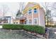 Charming two-story home with attached garage and privacy hedge for a secluded view at 4852 Gold Nugget Way, Sugar Hill, GA 30518