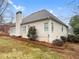 Exterior view of the backyard features ample space and sunlight, perfect for entertaining at 9135 Woodhaven Way, Mcdonough, GA 30253
