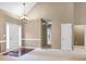 Welcoming entryway featuring vaulted ceilings and a modern front door and neutral décor at 9135 Woodhaven Way, Mcdonough, GA 30253