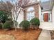 Charming home with stone accents, manicured landscaping, and a welcoming front entrance at 9135 Woodhaven Way, Mcdonough, GA 30253