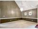 Elegant living room showcasing high ceilings, a modern chandelier, plush carpeting, and stylish decor at 9135 Woodhaven Way, Mcdonough, GA 30253