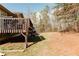 Expansive backyard with a wooden deck, offering plenty of room for outdoor activities and enjoying nature at 31 Wyngate Ct, Dallas, GA 30157