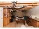 Unfinished basement with exposed rafters, concrete walls and a dirt floor at 31 Wyngate Ct, Dallas, GA 30157