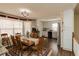 Bright dining area featuring a wood table, chairs, and view of kitchen area at 31 Wyngate Ct, Dallas, GA 30157